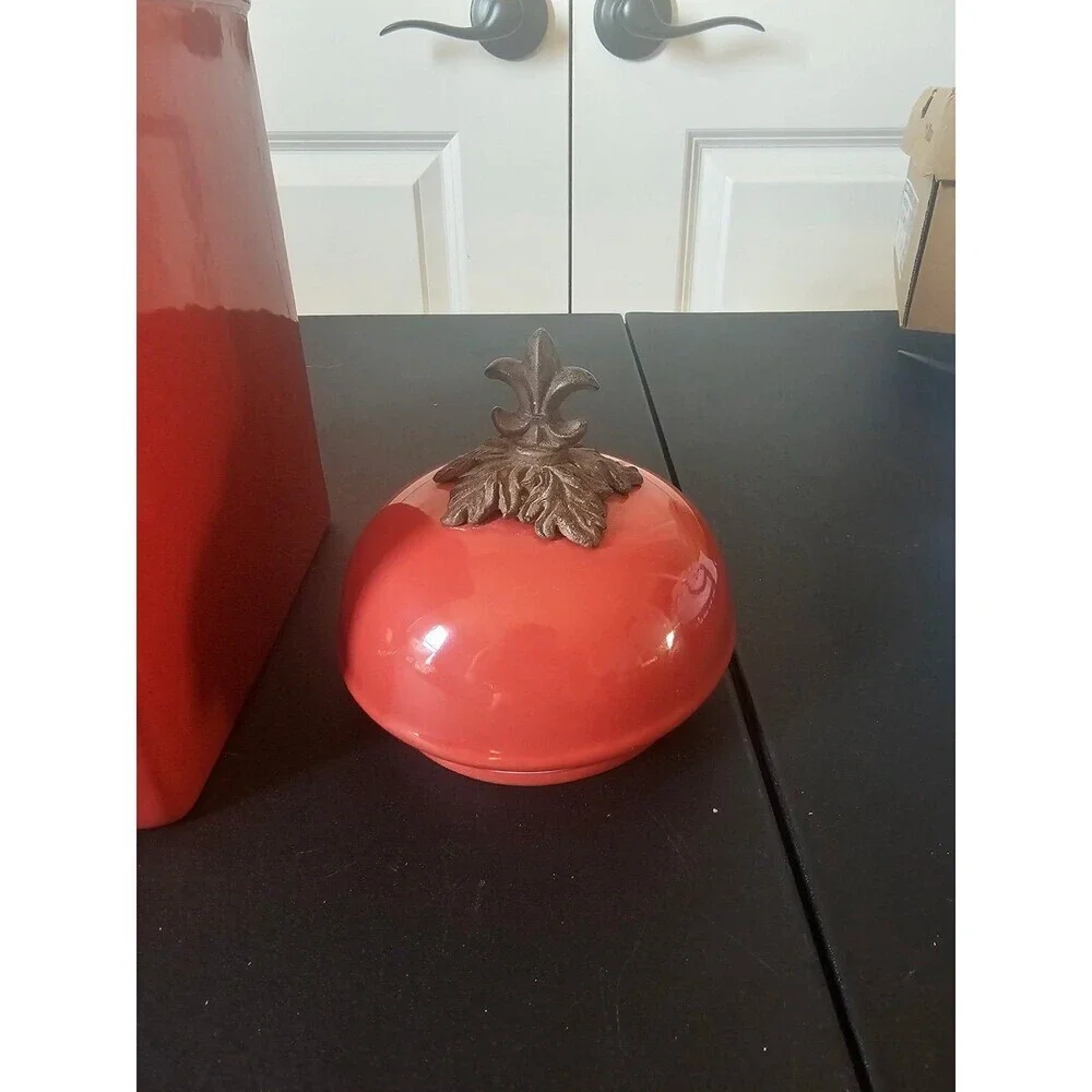 Belaverra red ceramic canister with metal base